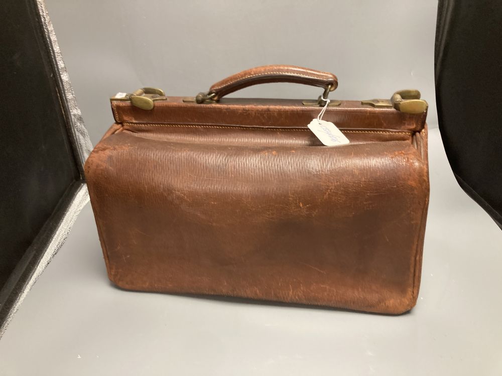 A brown leather Army & Navy Gladstone bag, width 41cm height 29cm